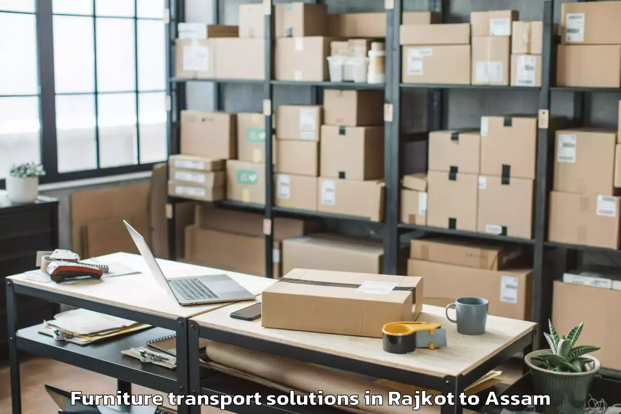 Book Rajkot to Haflong Furniture Transport Solutions Online